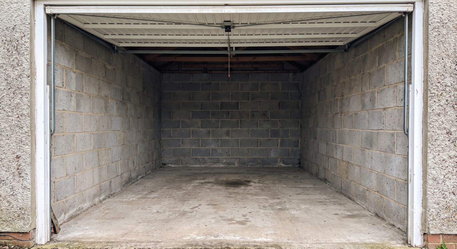 The same garage cleared and swept